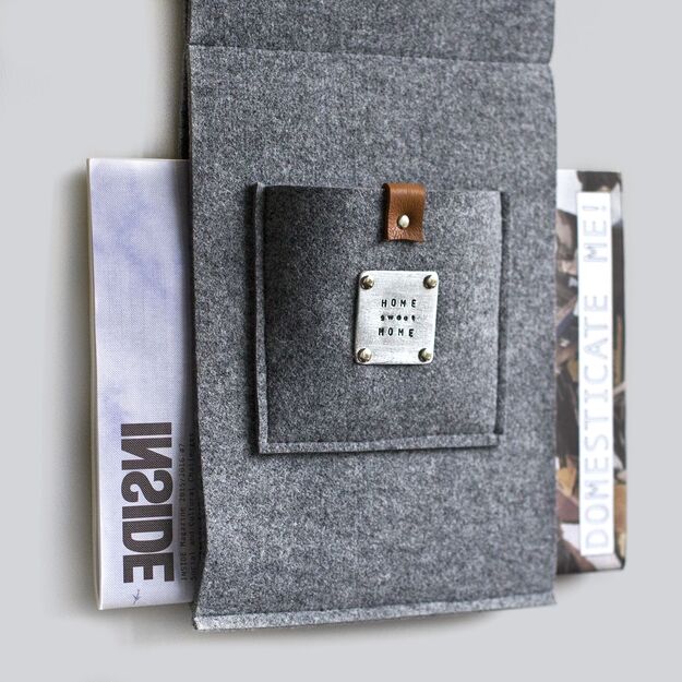 Magazine holder with pocket